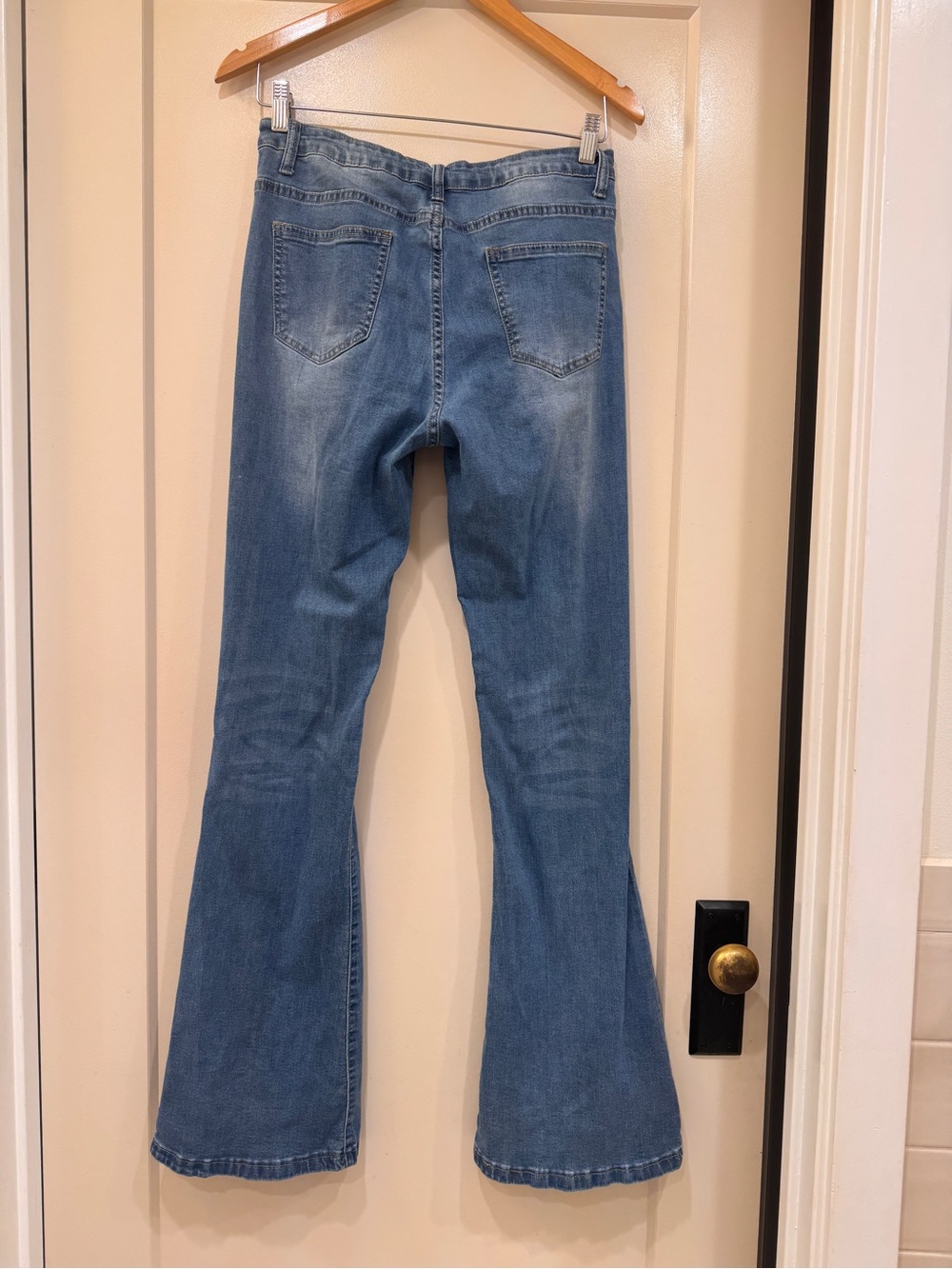 Classic Light Blue Distressed Flare Jeans - Women - Picture 2 of 3